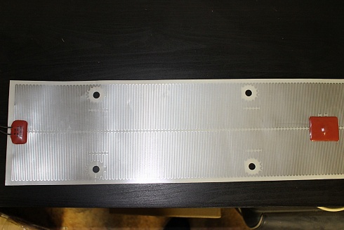 Poliesterio šildymo elementas