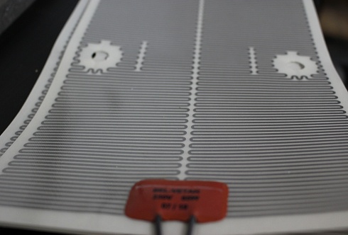 Poliesterio šildymo elementas